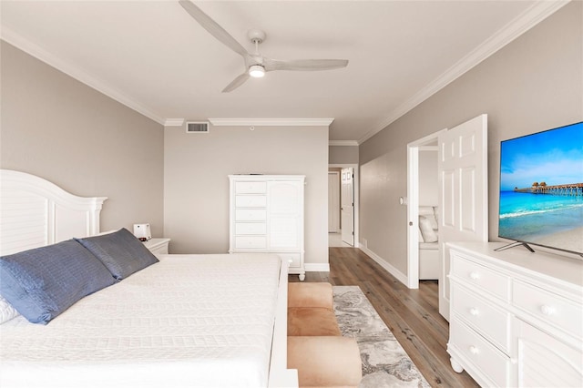 bedroom featuring ornamental molding, ceiling fan, and dark hardwood / wood-style flooring