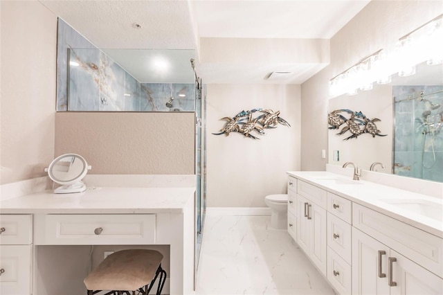 bathroom featuring walk in shower, vanity, and toilet