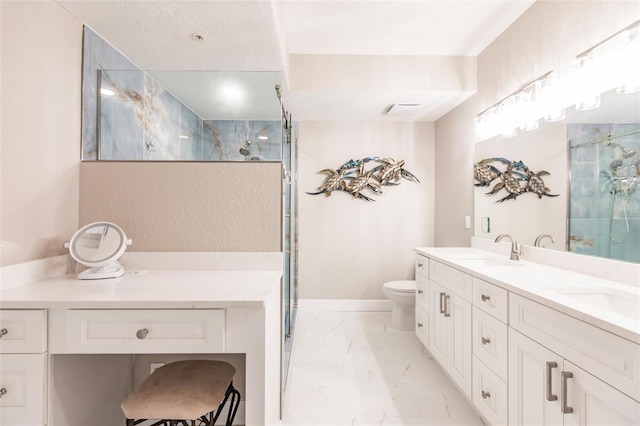 full bath featuring marble finish floor, a sink, and a shower with shower door