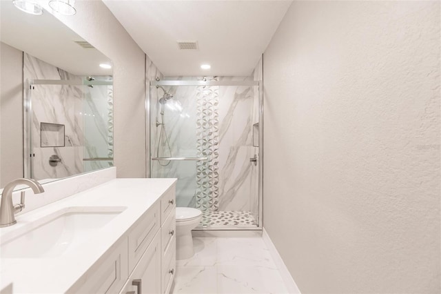 bathroom with vanity, a marble finish shower, toilet, marble finish floor, and visible vents