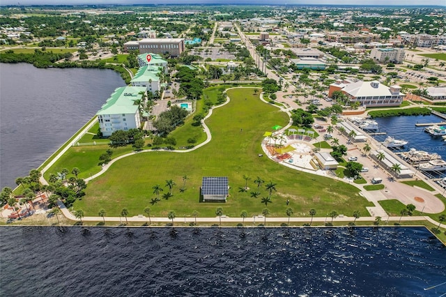 birds eye view of property featuring a water view