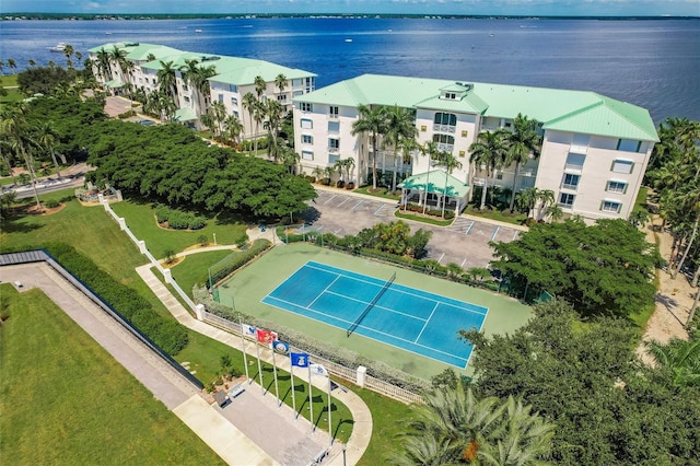 birds eye view of property featuring a water view