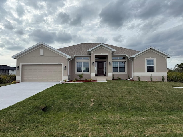 ranch-style home featuring a garage, driveway, a front lawn, and stucco siding