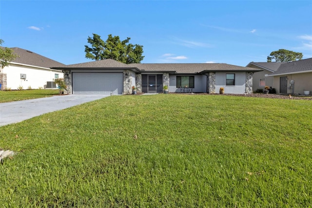 ranch-style house with a front lawn and a garage