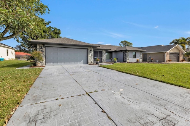 ranch-style home featuring a front yard and a garage