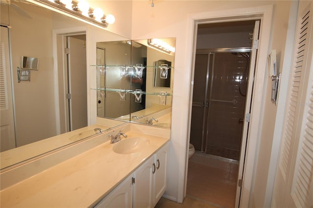 255 Mission Trl S Unit J, Venice, FL 34285 - full bath with toilet, vanity, tile patterned floors, and a stall shower
