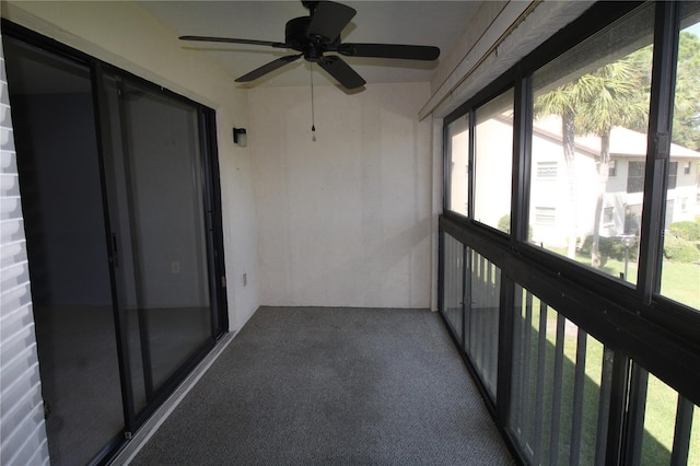 255 Mission Trl S Unit J, Venice, FL 34285 - unfurnished sunroom with plenty of natural light and a ceiling fan