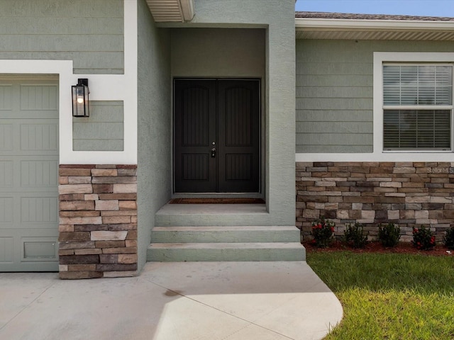 property entrance featuring a garage