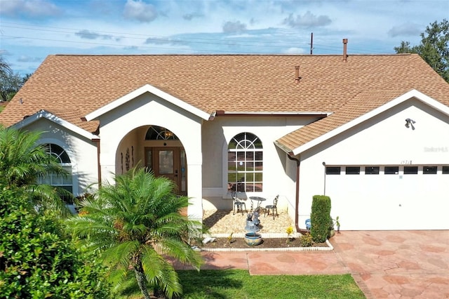 view of front of property featuring a garage