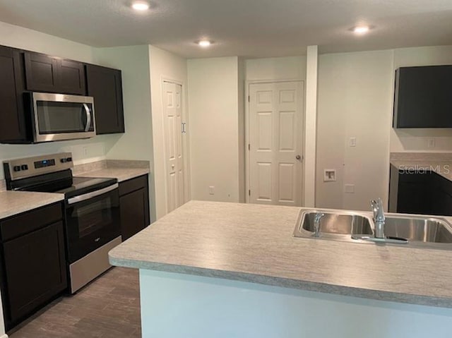 kitchen with appliances with stainless steel finishes and sink