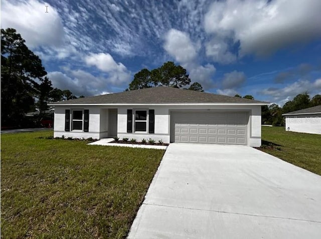 ranch-style house with a front lawn and a garage