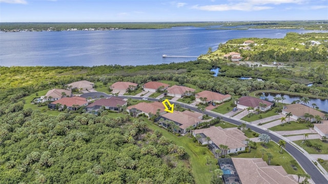 aerial view featuring a water view and a residential view