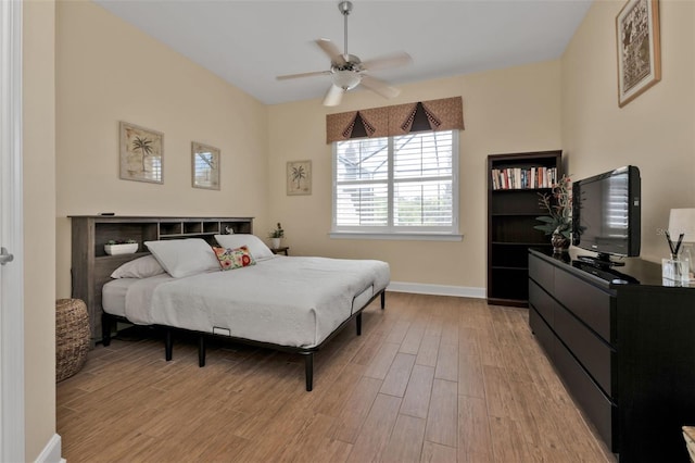 bedroom with light wood-type flooring and ceiling fan