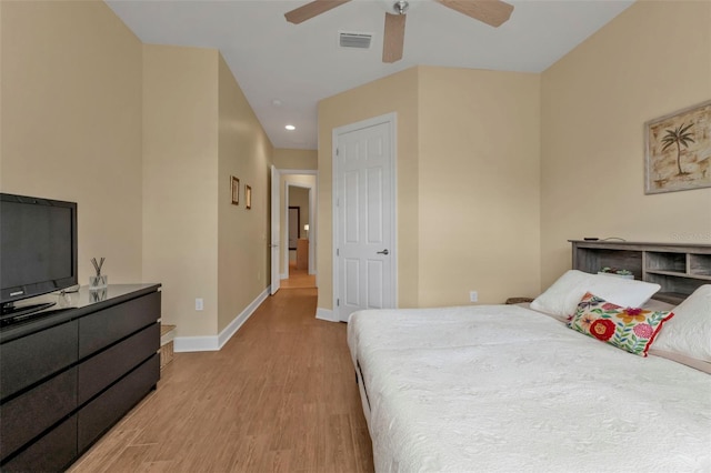 bedroom featuring light hardwood / wood-style floors and ceiling fan