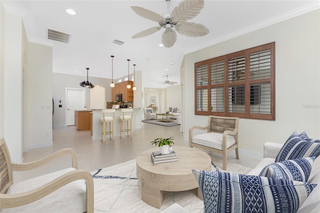 living room with ceiling fan, baseboards, crown molding, and visible vents