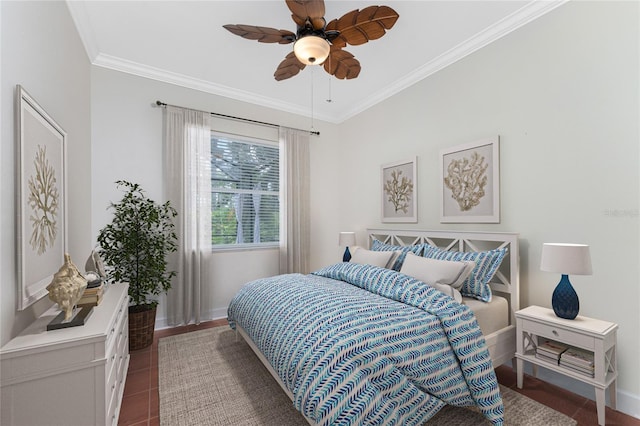 bedroom with ceiling fan, crown molding, and tile patterned flooring