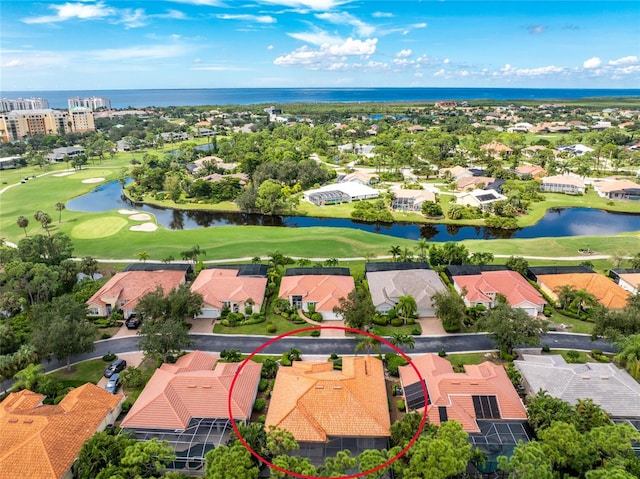 birds eye view of property featuring a residential view, a water view, and golf course view