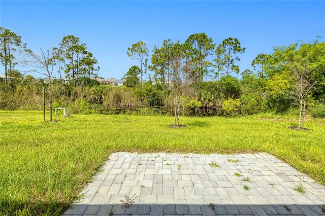 view of property's community featuring a patio area