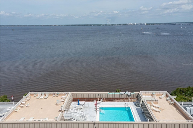 birds eye view of property featuring a water view