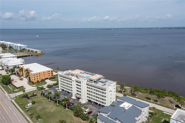 birds eye view of property featuring a water view