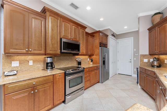 kitchen featuring stainless steel appliances, light stone counters, tasteful backsplash, and crown molding