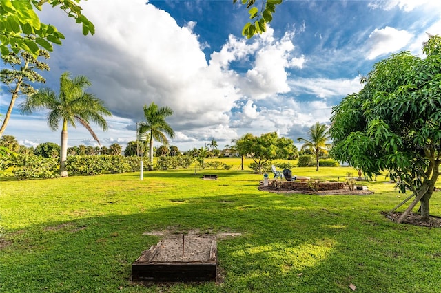 view of home's community with a lawn