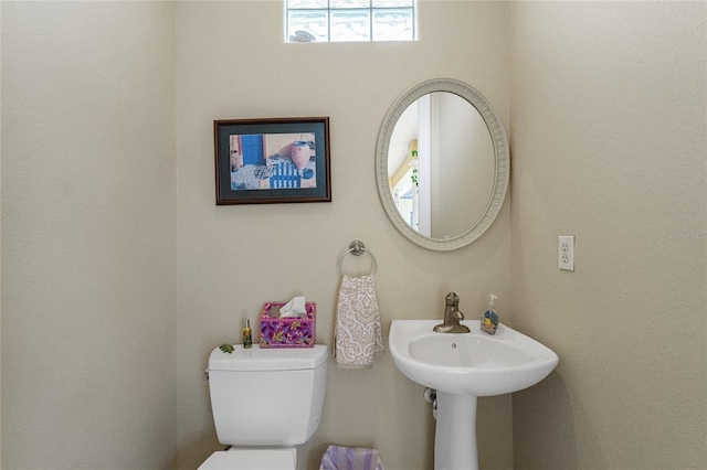 bathroom featuring toilet