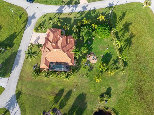 birds eye view of property with a rural view