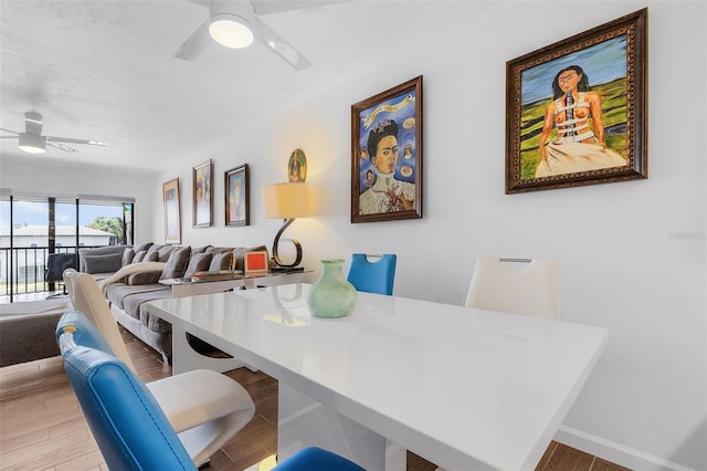 dining room featuring ceiling fan and light hardwood / wood-style flooring