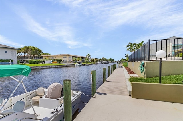 view of dock with a water view