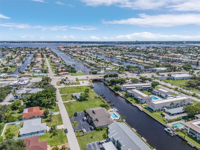 aerial view featuring a water view and a residential view