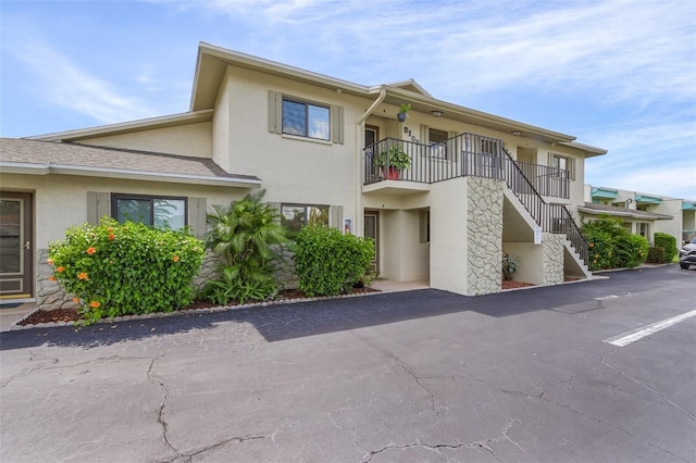 view of property with stairs