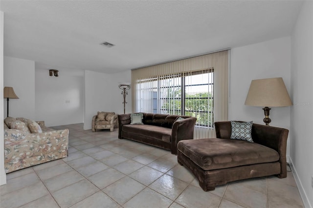 living room featuring light tile patterned floors