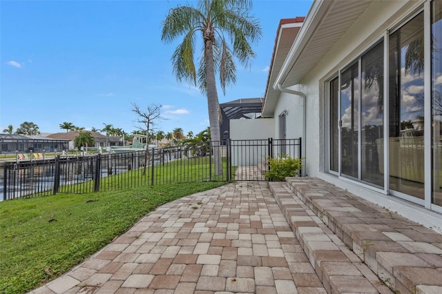 view of patio with a water view