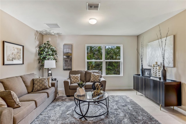 living room with light tile patterned flooring