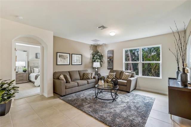 living room featuring light tile patterned flooring