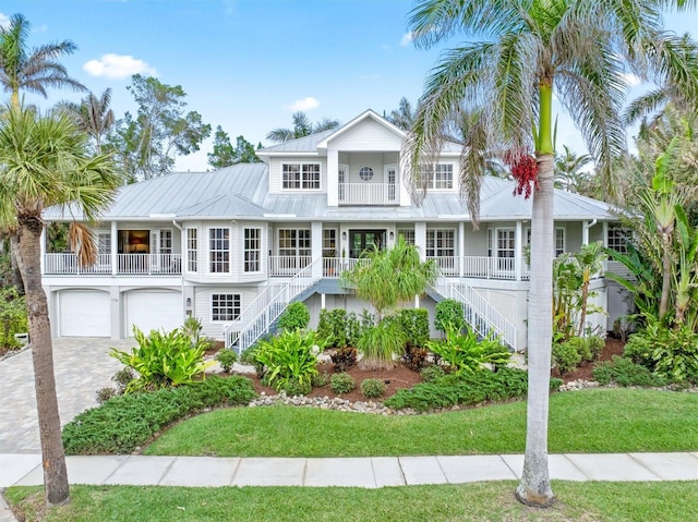 view of front of home with a garage and covered porch