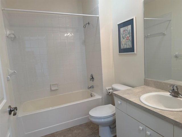 full bathroom with tile patterned flooring, shower / bath combination, vanity, and toilet