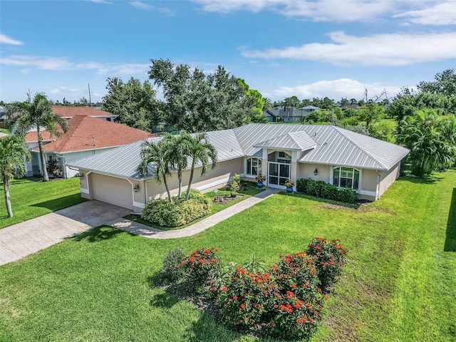 single story home with a garage and a front lawn