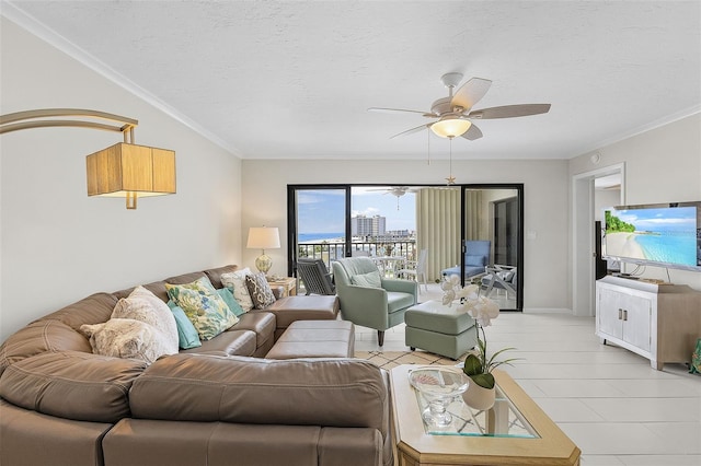 living room featuring crown molding, a textured ceiling, light tile patterned flooring, and ceiling fan