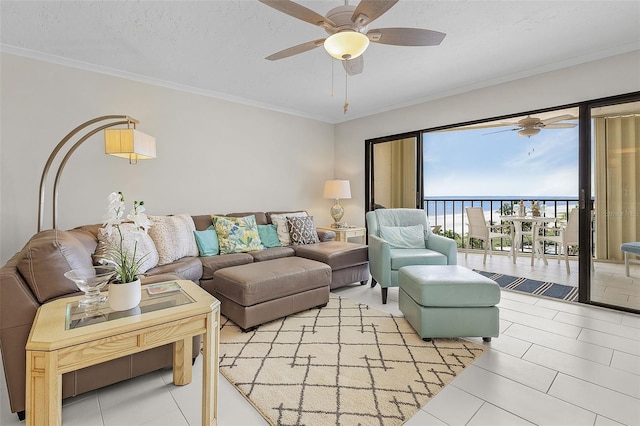 2532 Estero Blvd Unit 607, Fort Myers Beach, FL 33931 - living room with a ceiling fan, crown molding, and light tile patterned flooring
