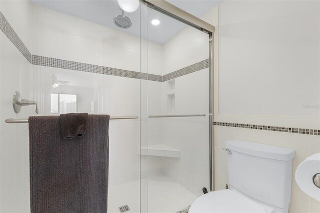 2532 Estero Blvd Unit 607, Fort Myers Beach, FL 33931 - bathroom featuring a stall shower and tile walls