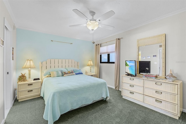 bedroom featuring crown molding, dark carpet, and ceiling fan