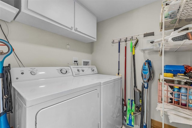 2532 Estero Blvd Unit 607, Fort Myers Beach, FL 33931 - laundry area with washer and clothes dryer and cabinet space