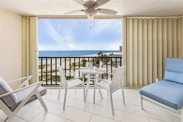 2532 Estero Blvd Unit 607, Fort Myers Beach, FL 33931 - balcony with view of water and beach and a ceiling fan