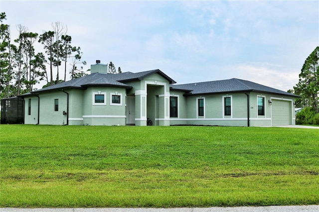 prairie-style house with a front yard and a garage