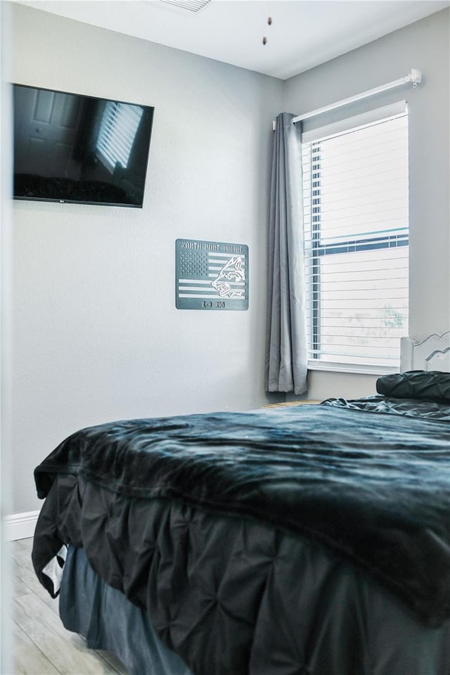 bedroom featuring light hardwood / wood-style flooring