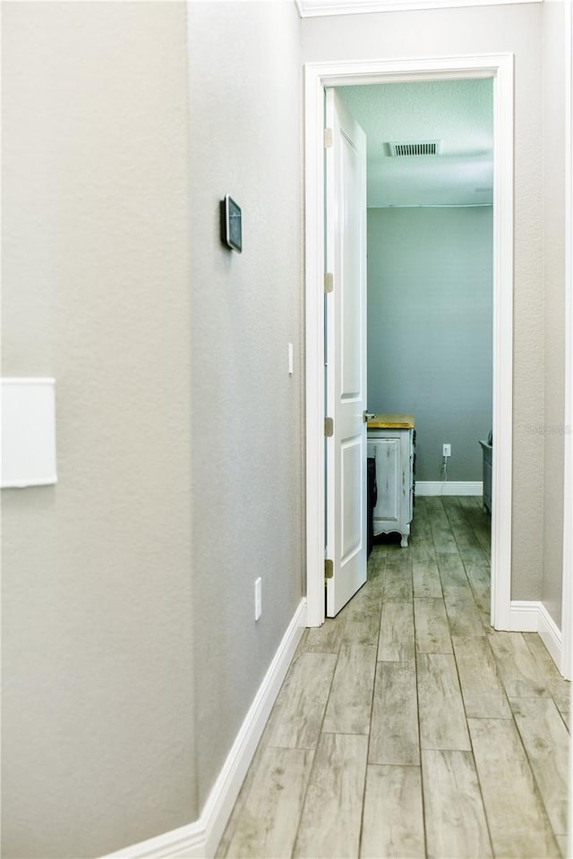 hallway featuring light hardwood / wood-style floors