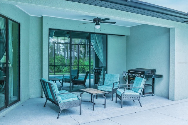 view of patio featuring ceiling fan