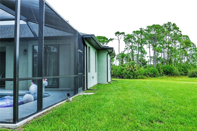 view of yard featuring a lanai